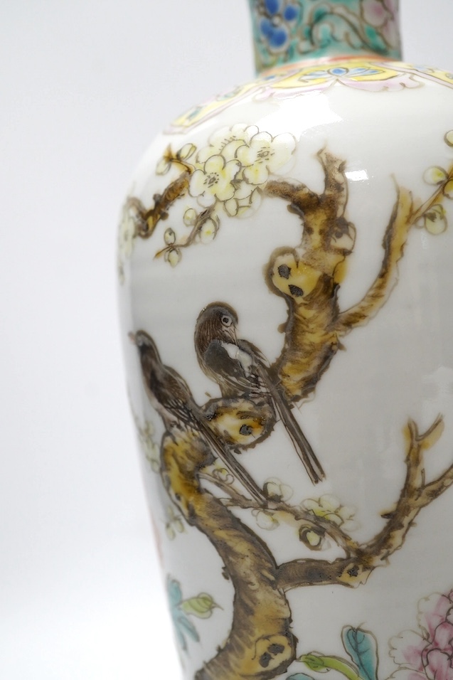 A pair of Chinese famille rose tapering vases, Qianlong mark but later, 23cm. Condition - good